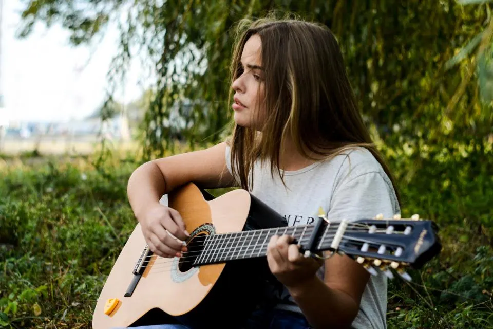 Aluna de violão